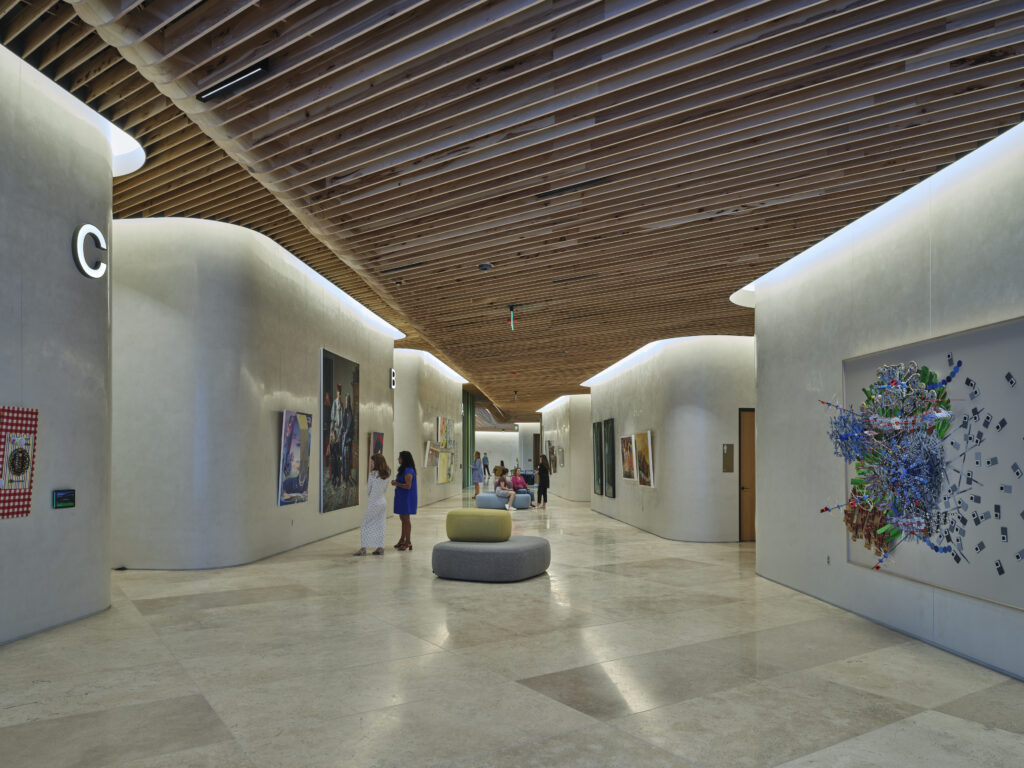 View down the gallery showcasing "The Art of Whole Health" exhibition