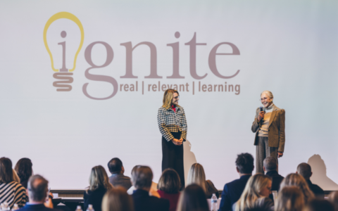Alice Walton on stage alongside Bentonville Schools Superintendent Dr. Debbie Jones.