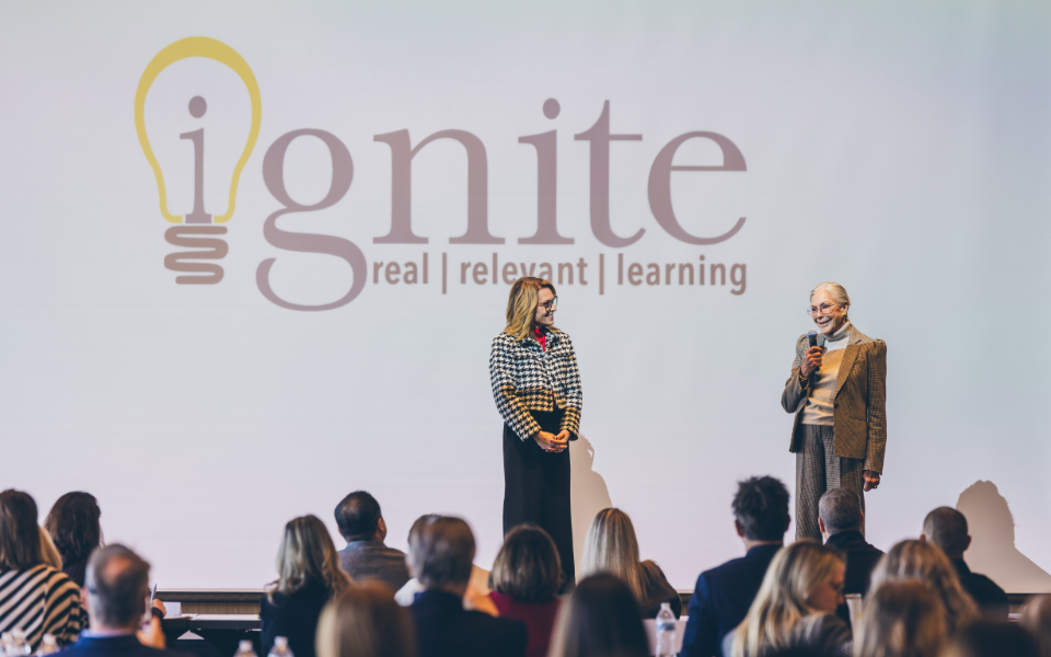 Alice Walton on stage alongside Bentonville Schools Superintendent Dr. Debbie Jones.