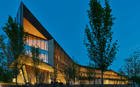 Exterior late evening image of the northwest corner of the Institute building.